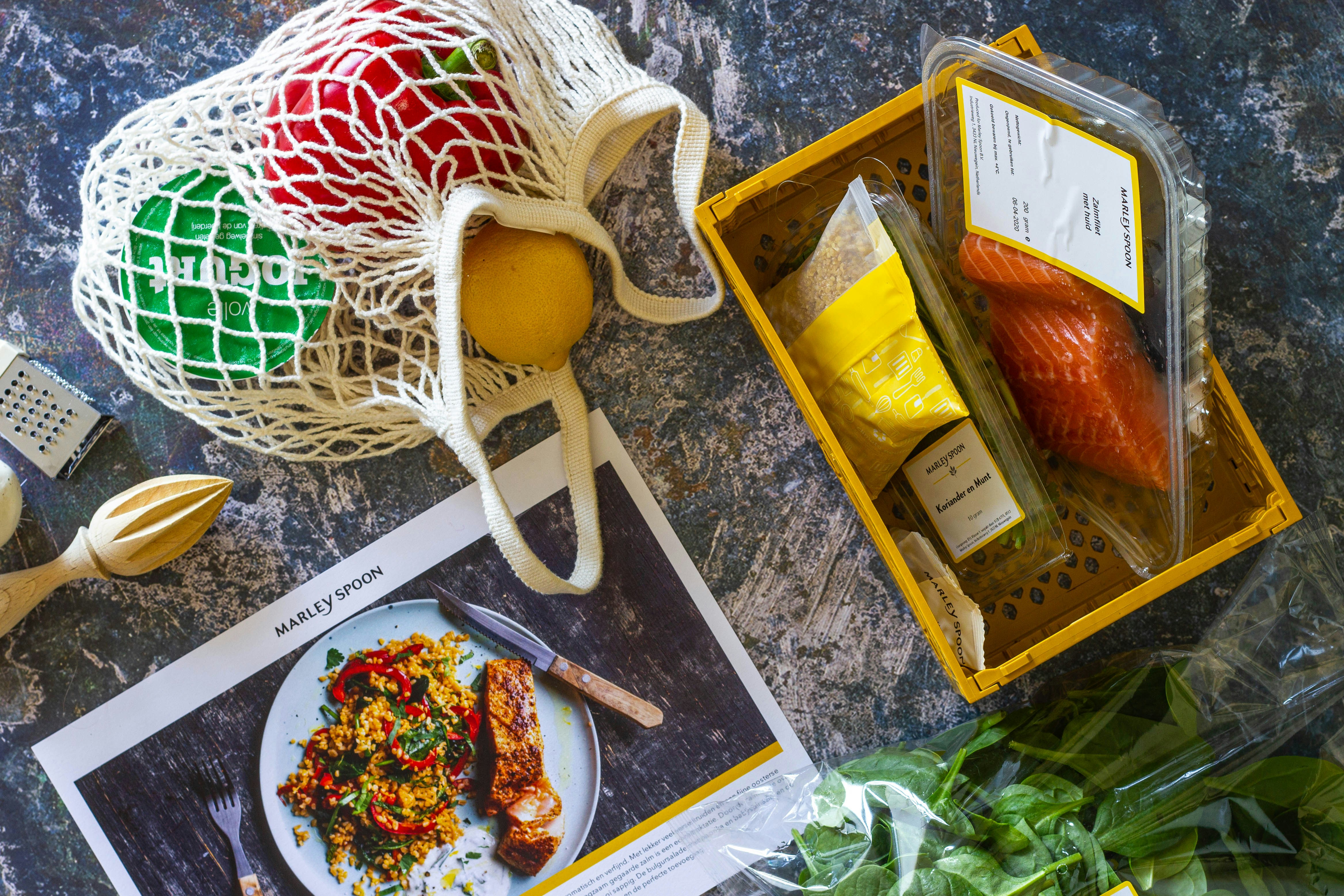 Chef Essentials ingredients with fresh produce, herbs, and a recipe card